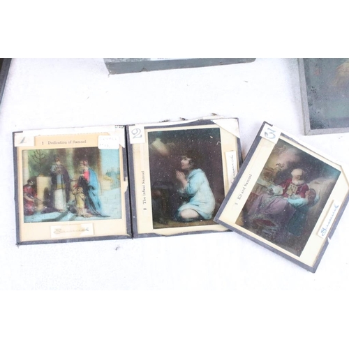 592 - A large collection of approx 200 x coloured glass magic lantern slides to include Alice in Wonderlan... 