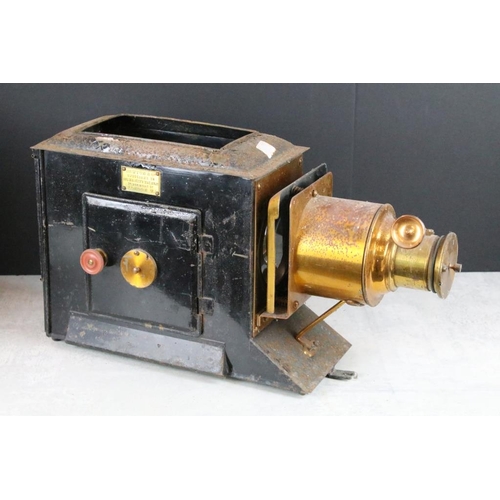 597 - A collection of five magic lantern slide projectors to include a Carpenter & Western Example.