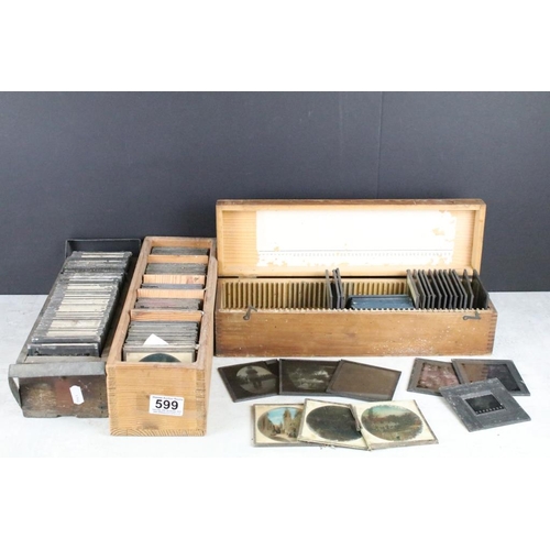 599 - A collection of over 100 magic lantern glass slides to include topographical & architectural example... 