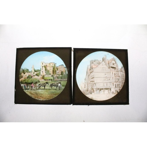 599 - A collection of over 100 magic lantern glass slides to include topographical & architectural example... 