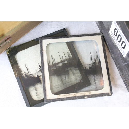 600 - A collection of over 100 magic lantern slides, mainly nautical to include sail boats, tall ships ...... 