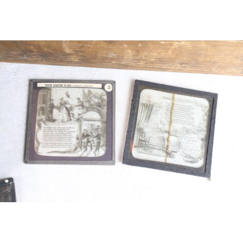 601 - A collection of over 100 magic lantern slides contained within three wooden boxes, mainly people to ... 