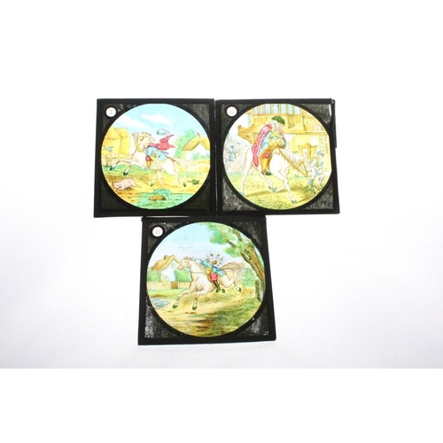 604 - A collection of over 100 glass magic lantern slides contained within three wooden boxes to include W... 