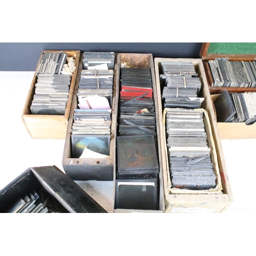 607 - A collection of approx 200 x glass magic lantern slides within seven boxes to include Religious, Ali... 