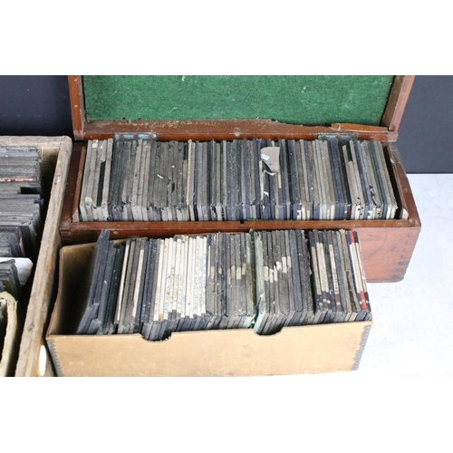 607 - A collection of approx 200 x glass magic lantern slides within seven boxes to include Religious, Ali... 