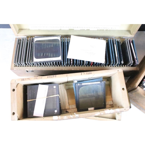 609 - Three small boxes of magic lantern slides to include portraits of Queen Victoria, the wreck of hespe... 