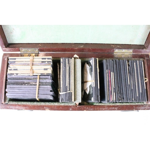 614 - Three boxes of magic lantern slides to include Biblical and from life model stories including the ro... 