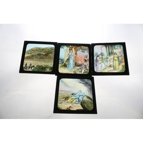 623 - A collection of approx 100 x glass magic lantern slides contained within three wooden cases to inclu... 