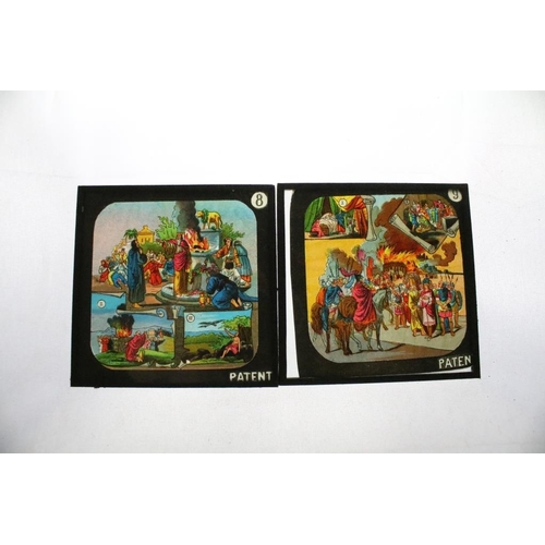 624 - A collection of approx 100 x glass magic lantern slides contained within three wooden cases to inclu... 