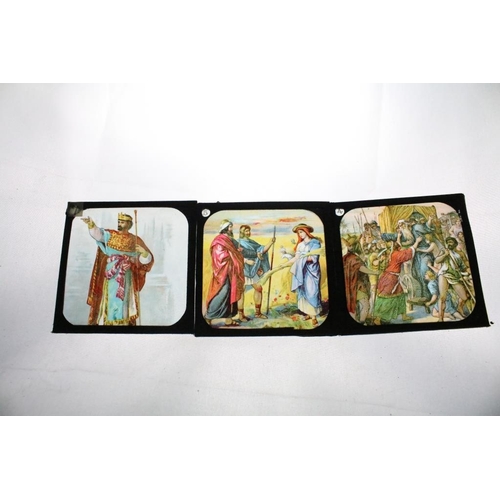 624 - A collection of approx 100 x glass magic lantern slides contained within three wooden cases to inclu... 