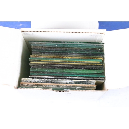 630 - A collection of glass magic lantern slides, glass negatives and a selection of Lithophanes.