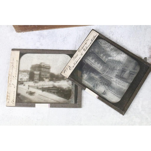 631 - A collection of over 50 glass magic lantern slides, mainly topographical examples to include Devon, ... 