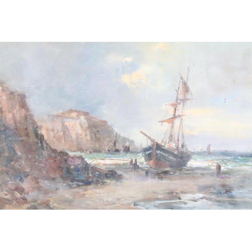 407 - Gilt framed Oil Painting of a beached sailboat with figures in a cove with cliffs beyond, 25cm x 35c... 