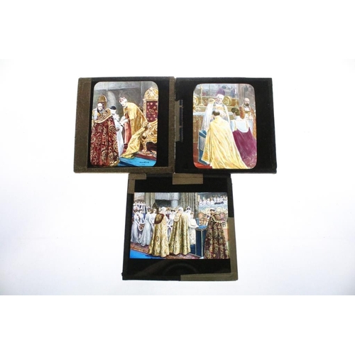 635 - A collection of over 100 glass magic lantern slides contained within four wooden cases to include Ro... 