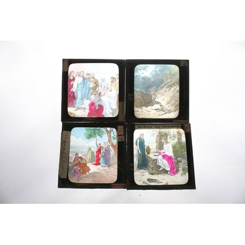 635 - A collection of over 100 glass magic lantern slides contained within four wooden cases to include Ro... 