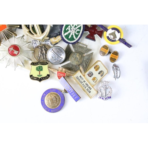 198 - A collection of mixed button, enamel and cloth badges to include music, military, association and cl... 