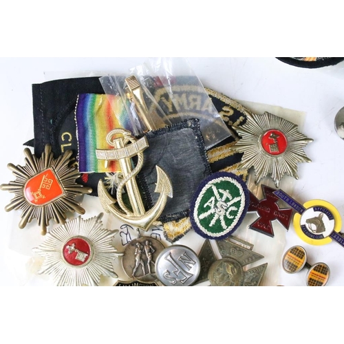 198 - A collection of mixed button, enamel and cloth badges to include music, military, association and cl... 