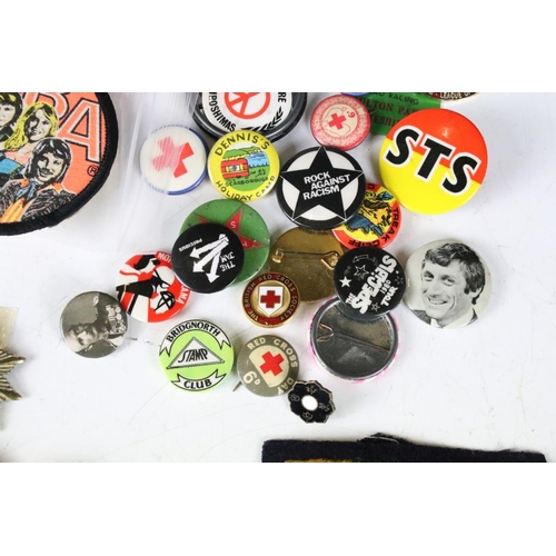 198 - A collection of mixed button, enamel and cloth badges to include music, military, association and cl... 