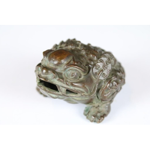 209 - A Chinese lucky Jin Chan ornamental money toad bronze rattling figure.