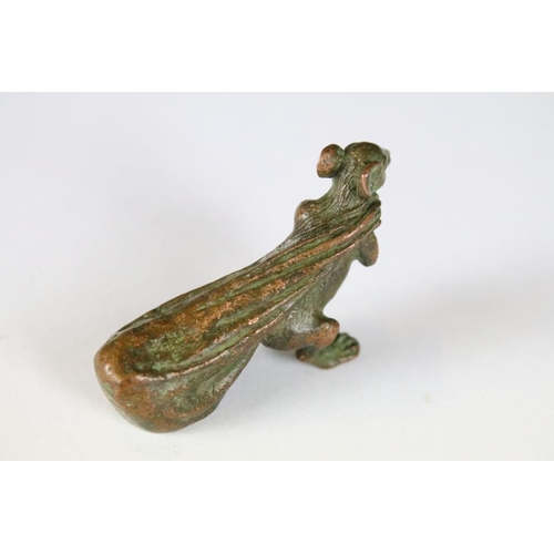 210 - An ornamental Solid brass lucky fortune rat with bag.