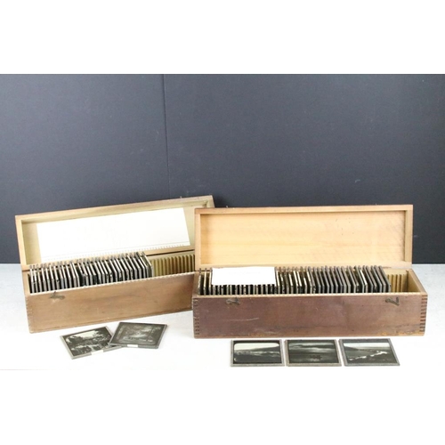 639 - A collection of approx 50 glass magic lantern slides contained within two wooden cases, all topograp... 