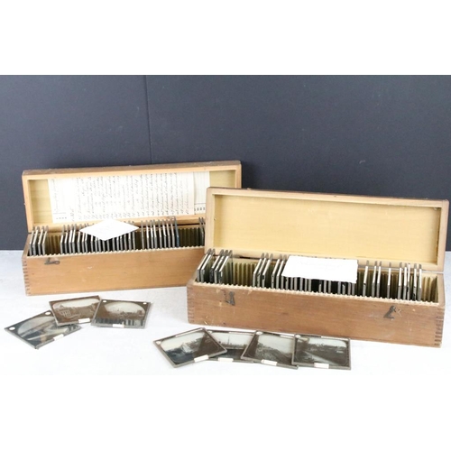 640 - A collection of approx 50 glass magic lantern slides contained within two wooden cases, all topograp... 