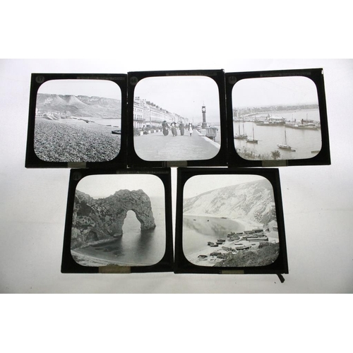 640 - A collection of approx 50 glass magic lantern slides contained within two wooden cases, all topograp... 