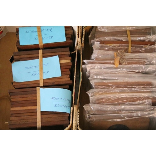 650 - A large collection of wooden framed coloured magic lantern slides to include lever action examples, ... 