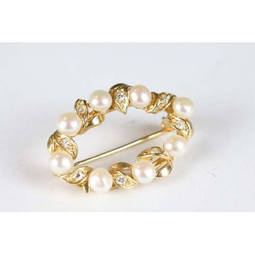 228A - A ladies 14ct gold and seed pearl brooch together with a 14ct gold ring.