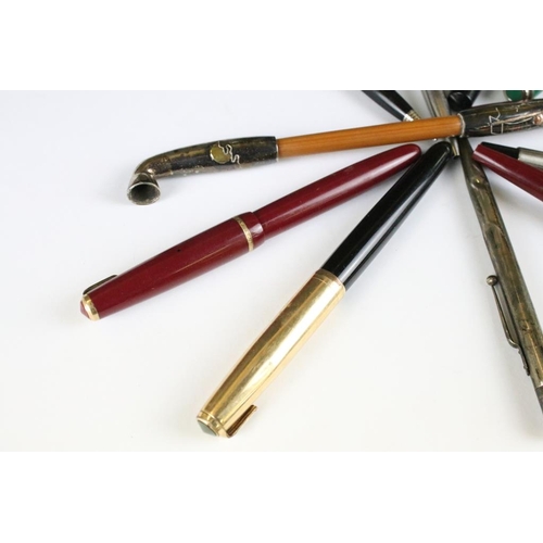 244 - A collection of pens and pencils to include Parker fountain pens and sterling silver propelling penc... 