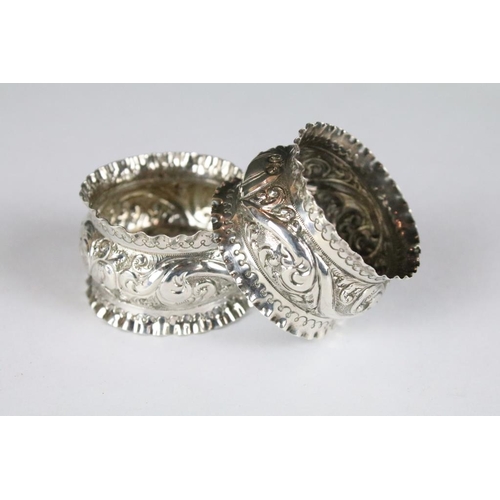 249 - A pair of fully hallmarked sterling silver napkin rings within original fitted retailers display cas... 