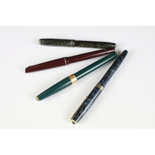 255 - A small collection of vintage pens to include Parker and Conwy Stewart examples.