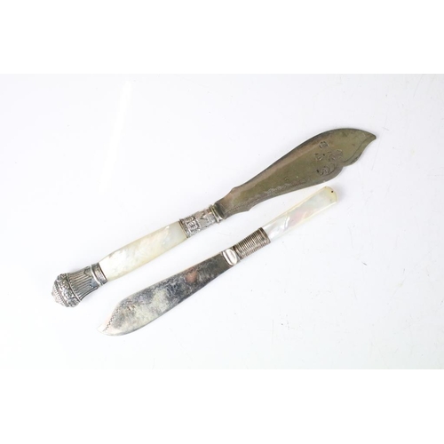 257 - A set of six knives and forks with hallmarked sterling silver handles.