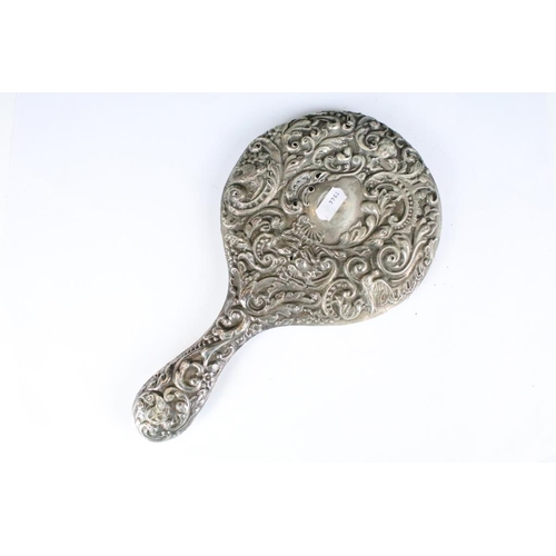 263 - A fully hallmarked sterling silver brush together with a similar hand mirror.