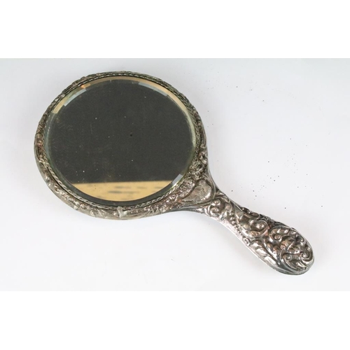 263 - A fully hallmarked sterling silver brush together with a similar hand mirror.