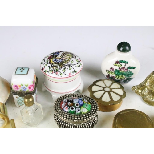 311 - A small collection of trinket boxes together with a snuff bottle, miniature clock, brass figure...et... 