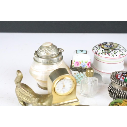 311 - A small collection of trinket boxes together with a snuff bottle, miniature clock, brass figure...et... 