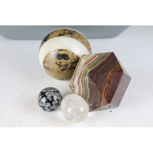 313 - A collection of polished semi precious stone ornaments.