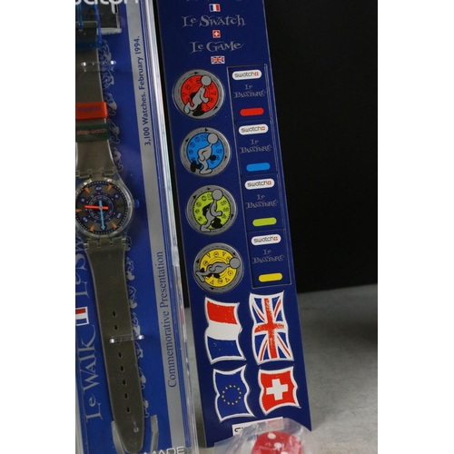 267 - A collection of four Swatch watches to include the Breakfast watch, 100 Years of the Olympic movemen... 