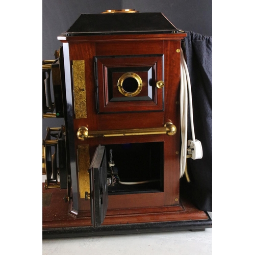 670 - Large 19th century mahogany, gilt brass & tinplate magic lantern projector, converted to electric, w... 