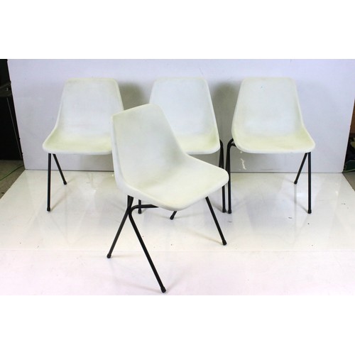 514 - Four Stacking Robin Day ‘ Hilles ‘ White Chairs with black legs