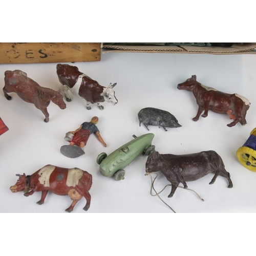 350 - Over 30 mid 20th C play worn metal farm animals, farmworkers & accessories (featuring Britains & Tim... 