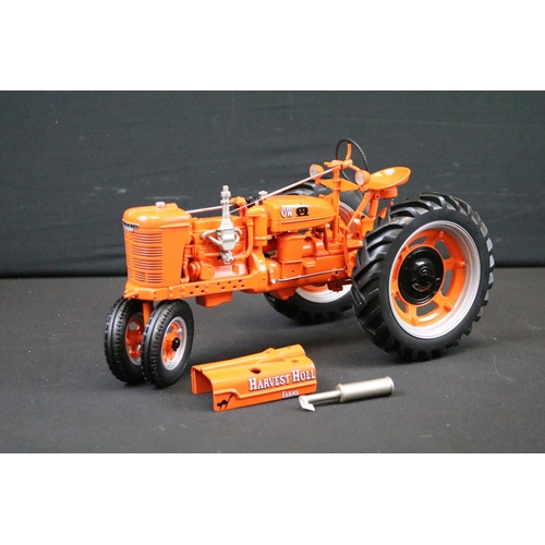 1109 - Three boxed Franklin Mint diecast model tractors to include 1953 Ford Tractor, Farmall Model H and T... 