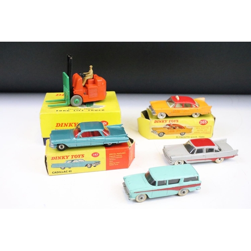 1445 - Three boxed Dinky diecast models to include 401 Coventry Climax Fork Lift Truck, 147 Cadillac 62 and... 