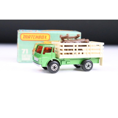 1447 - Ex Shop Stock - 12 Boxed Matchbox 75 Series diecast models to include 35 Zoo Truck ,71 Cattle Truck,... 