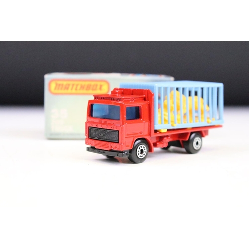 1447 - Ex Shop Stock - 12 Boxed Matchbox 75 Series diecast models to include 35 Zoo Truck ,71 Cattle Truck,... 