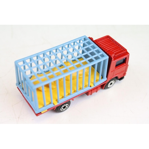 1447 - Ex Shop Stock - 12 Boxed Matchbox 75 Series diecast models to include 35 Zoo Truck ,71 Cattle Truck,... 