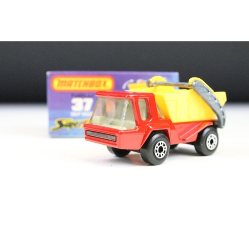 1447 - Ex Shop Stock - 12 Boxed Matchbox 75 Series diecast models to include 35 Zoo Truck ,71 Cattle Truck,... 