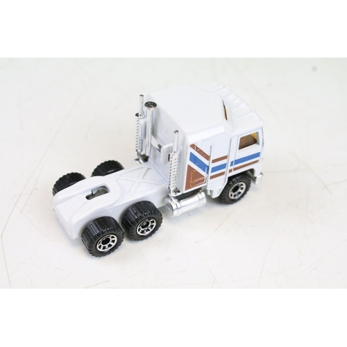 1447 - Ex Shop Stock - 12 Boxed Matchbox 75 Series diecast models to include 35 Zoo Truck ,71 Cattle Truck,... 