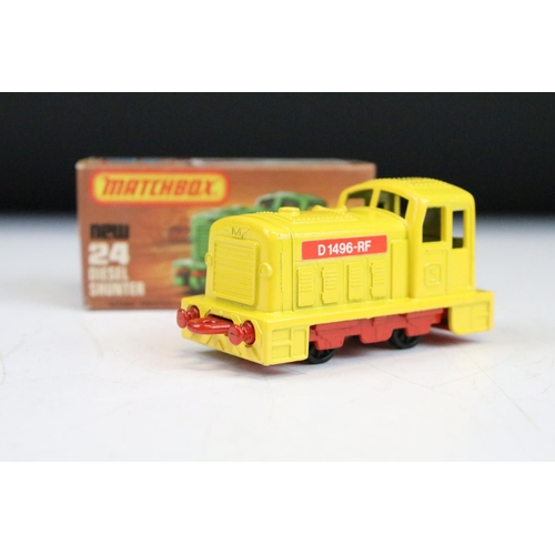 1448 - Ex Shop Stock - 12 boxed Matchbox 75 Series diecast models to include 25 Flat Car/Container, 66 Tyro... 